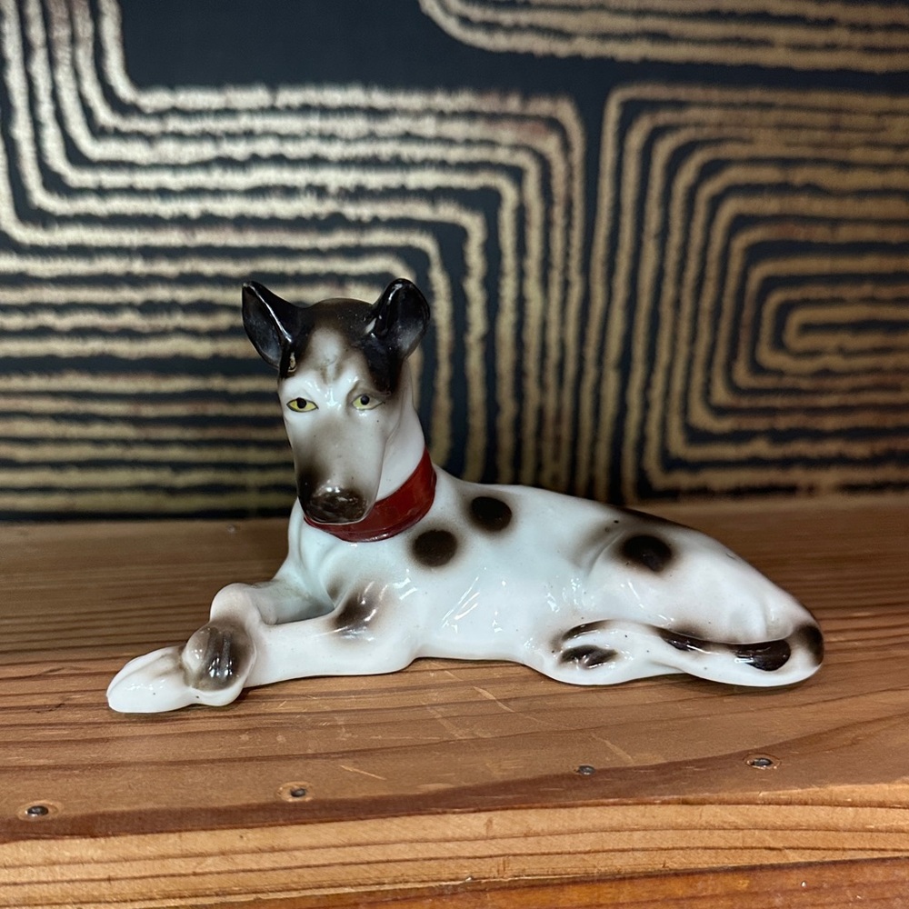 Charming Canine Porcelain Figurine with Red Collar